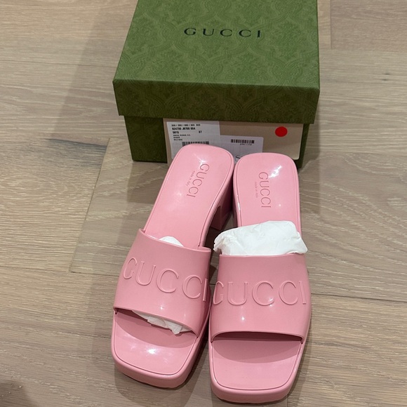 Gucci Shoes - Authentic and brand new with box Gucci Pink Embossed Logo Slide Mules